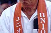 A community Elder enjoying the proceedings
